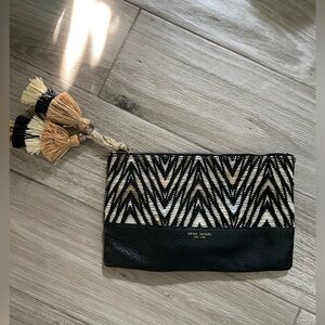 Henri Bendel flat raffia  tassel and leather pouch clutch purse